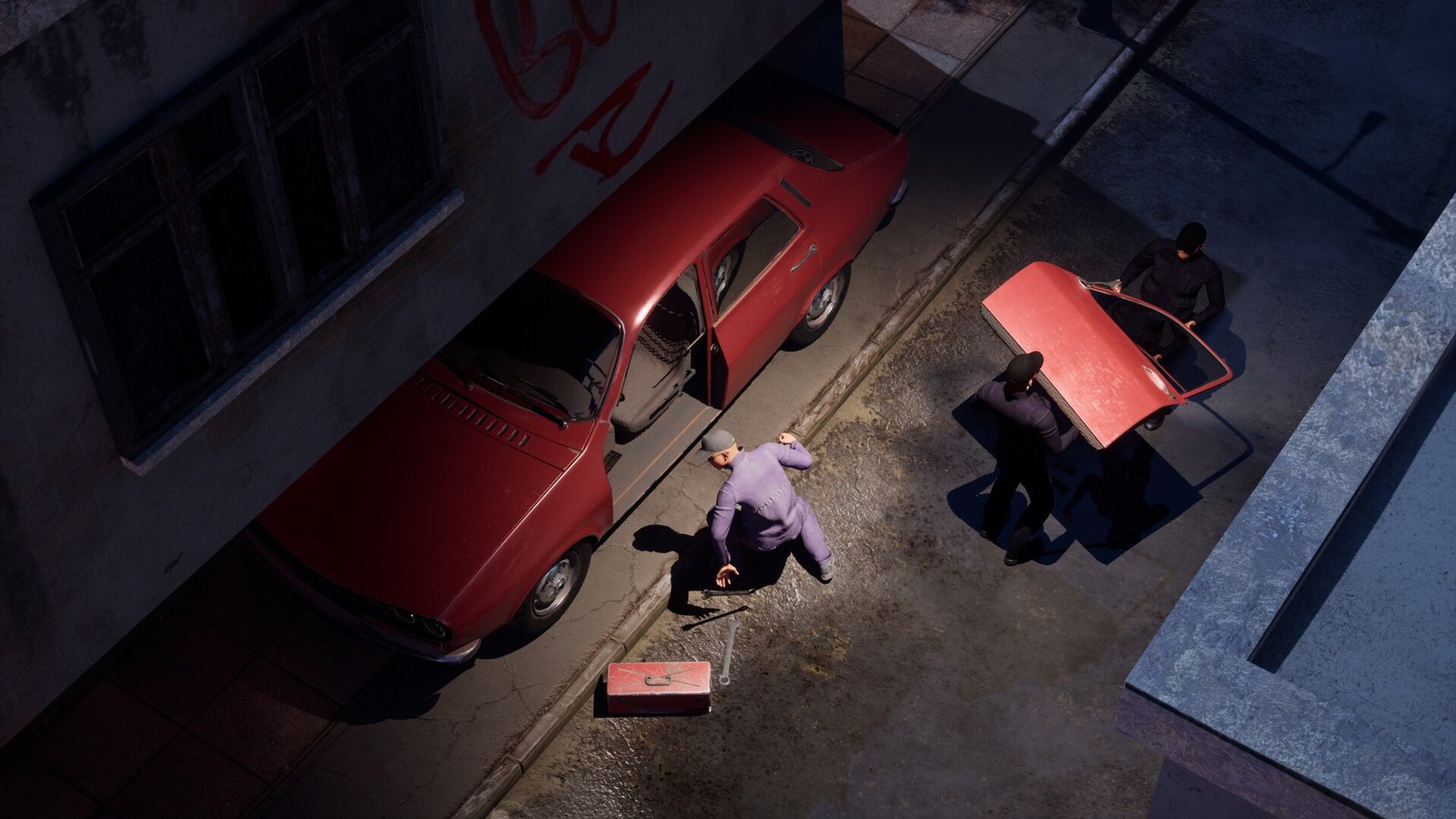 A crew removing parts from a parked car